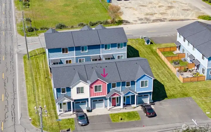 2nd townhouse with the red paint could by yours! Super close to the beach and beautiful inside.