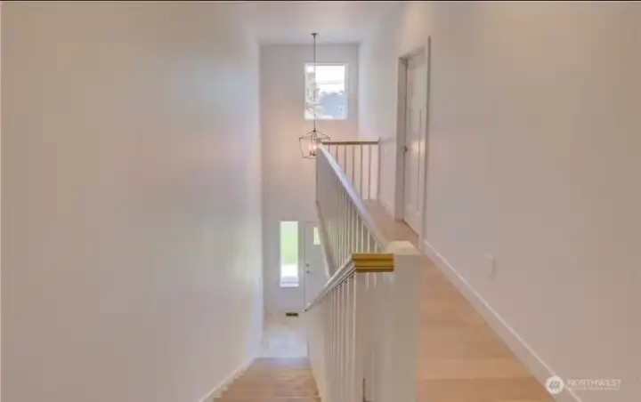 The door at the end is one of the two ensuites upstairs.