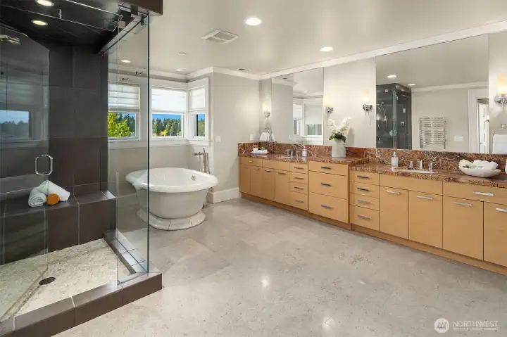 Primary bathroom with heated floors, steam shower, and views of Lake Washington.