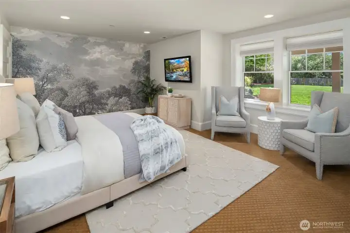 Lower level ensuite with large walk-in closet and private bathroom, adjacent to living area, kitchenette and outdoor patio.