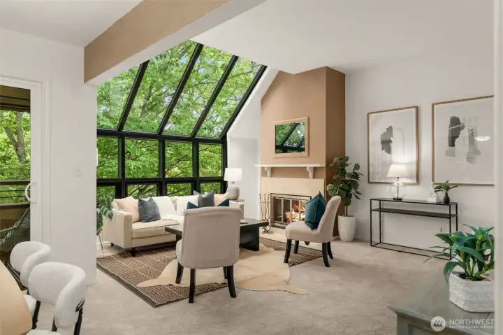 top floor wall of windows in this spacious living room