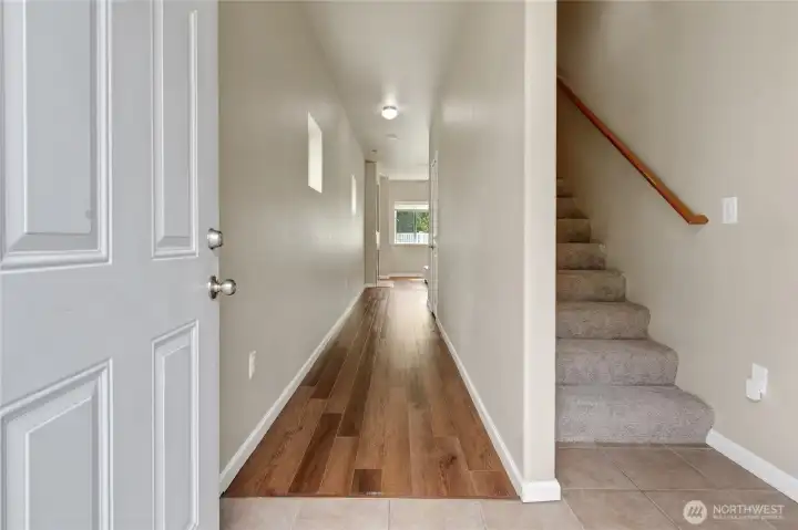Welcoming entryway with a bright atmosphere and warm, inviting feel from the moment you step inside.