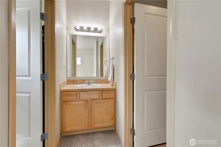 Primary bathroom with a sink, designed for everyday convenience and functionality.