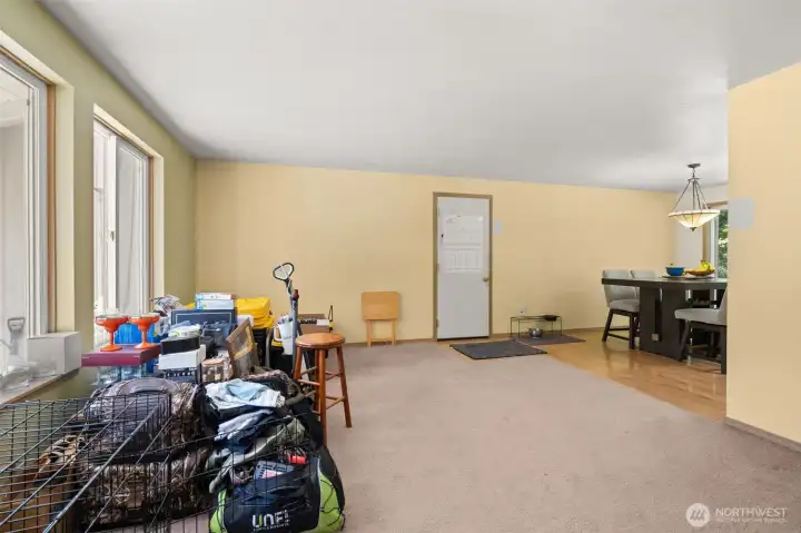 Livingroom with door to garage.