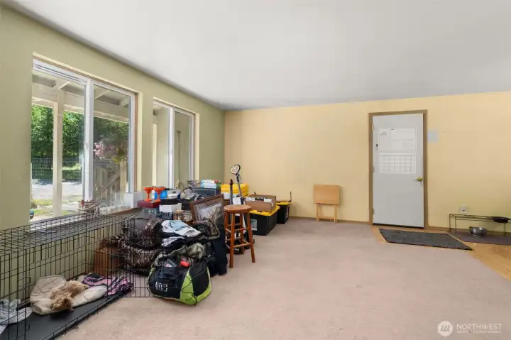 Livingroom with door to garage.