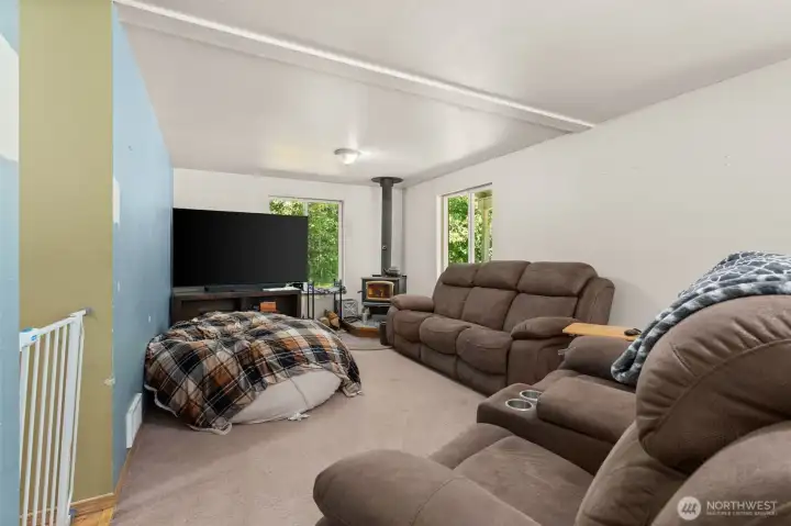 Family room/den with wood stove.