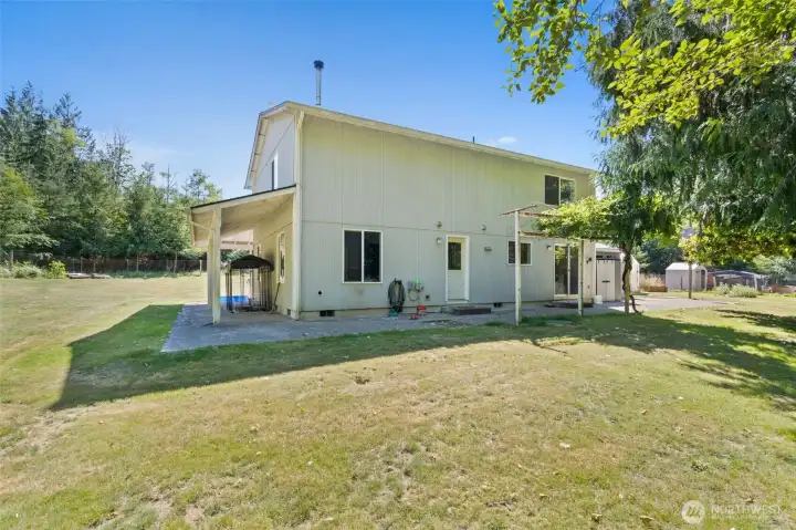 Large fenced yard around house.