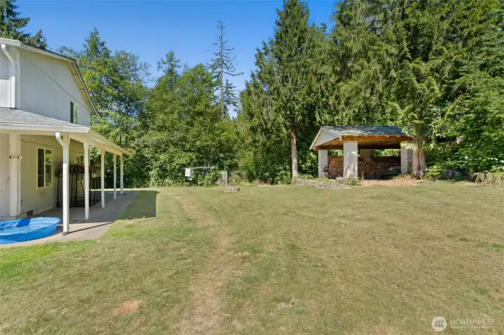 Side yard with 20x28 covered area on right.