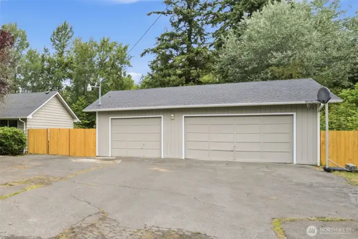 3 Car Garage w/ very wide driveway 3 Car Garage w/ very wide driveway