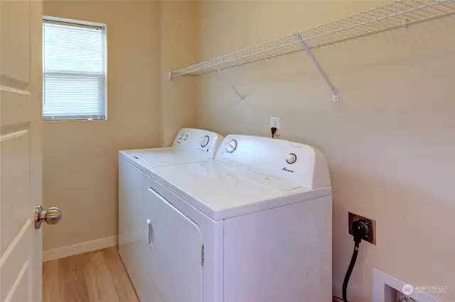 Laundry room. Washer and dryer to stay with the home.
