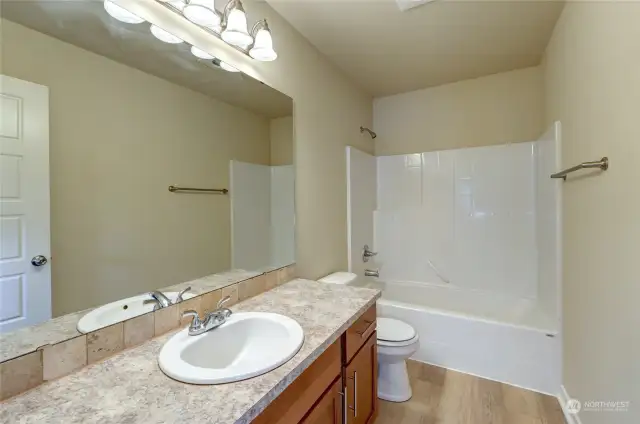 Main Bathroom is convenient to the upstairs 2 secondary bedrooms.