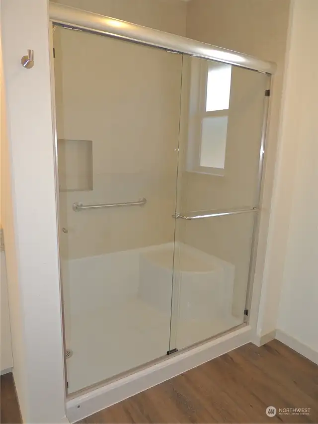 Shower with seat and tile walls