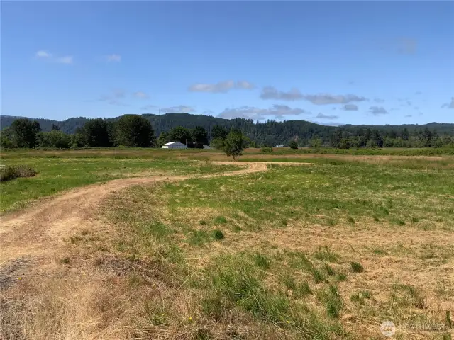 Rock-fill road into leveled area