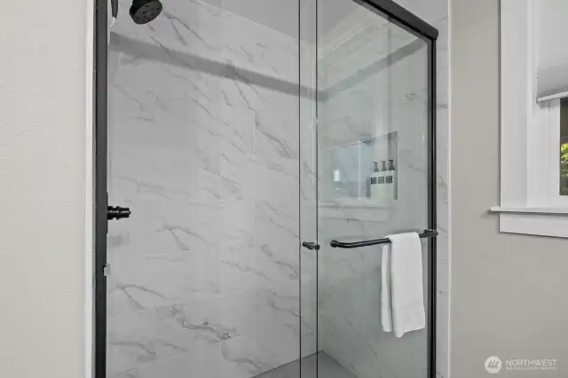 Primary walk-in shower.