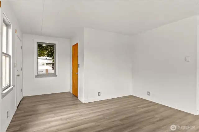 Front door opens to foyer and coat closet.