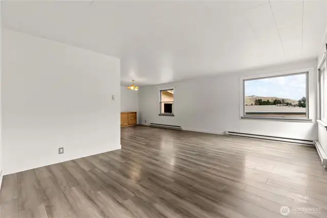 Spacious Living room. Vinyl Plank floor.