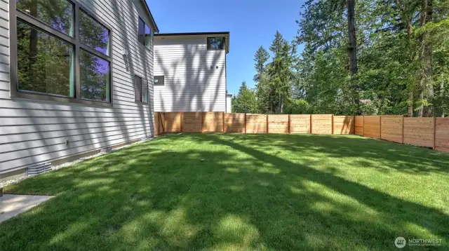 Big and leveled backyard offers countless possibilities!