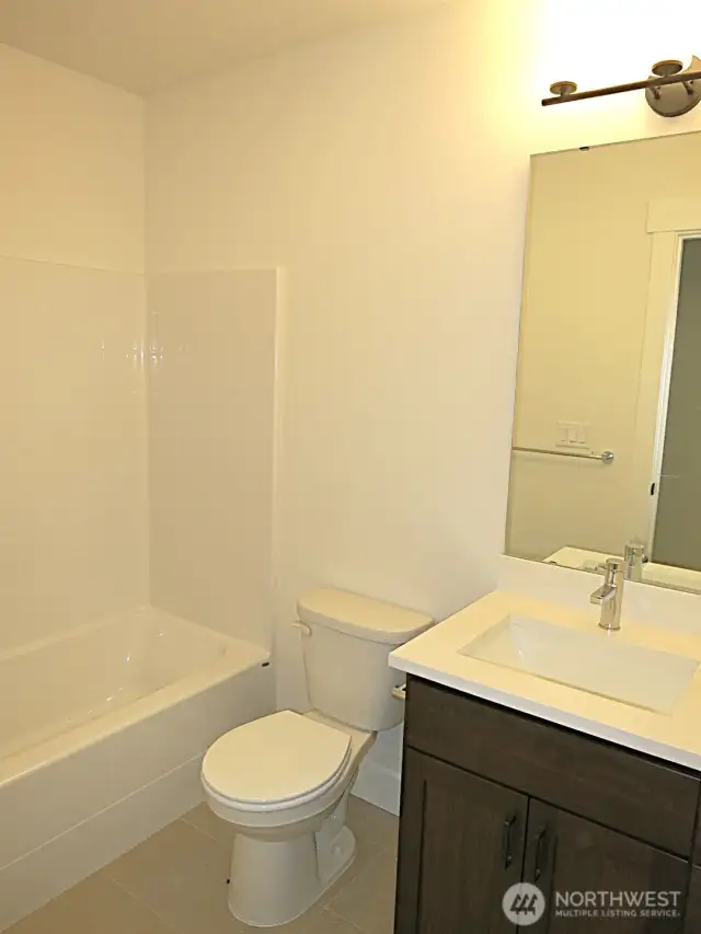 Downstairs full bathroom.