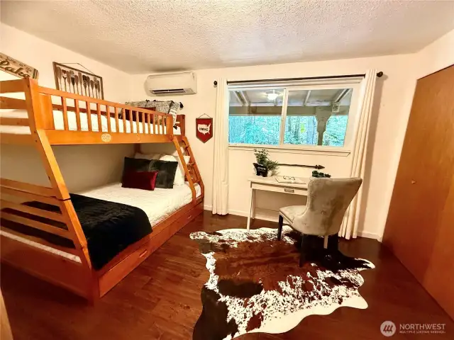 Large bedroom or den/office with plenty of storage space..bunk beds stay!