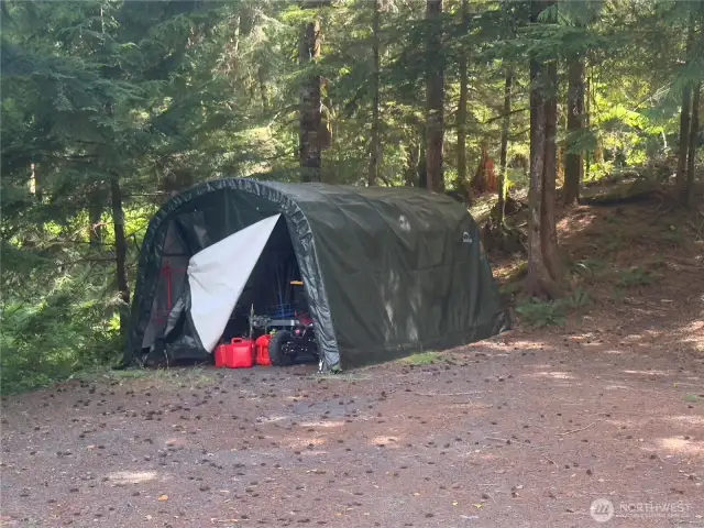 Portable carport for extra storage stays!