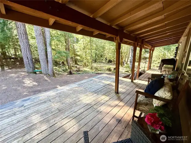 Perfect covered deck for peaceful morning cup of coffee!