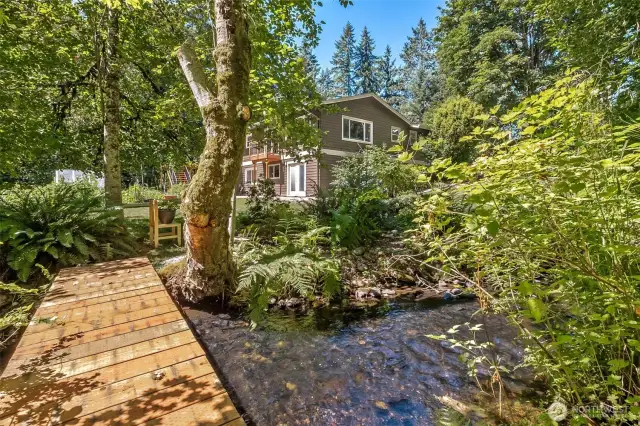 Your at-home retreat! Surrounded by Little Soos Creek which provides a pathway for nature: deer, otters, ducks, herons and even salmon in a good year!
