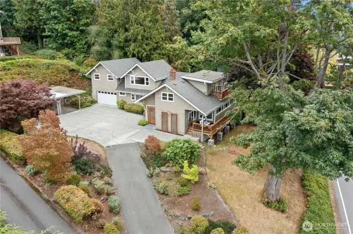 Panoramic Southwesterly views of Lake Washington, Magnuson Park, and stunning sunsets from both levels.