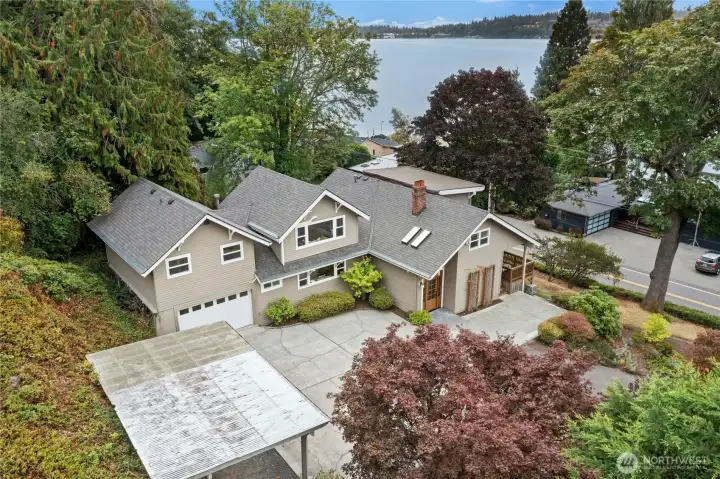. Located just a few blocks from Denny Park, the community boat launch, and surrounded by over 600 acres of protected forests and trails, this is an outdoor enthusiast’s paradise.