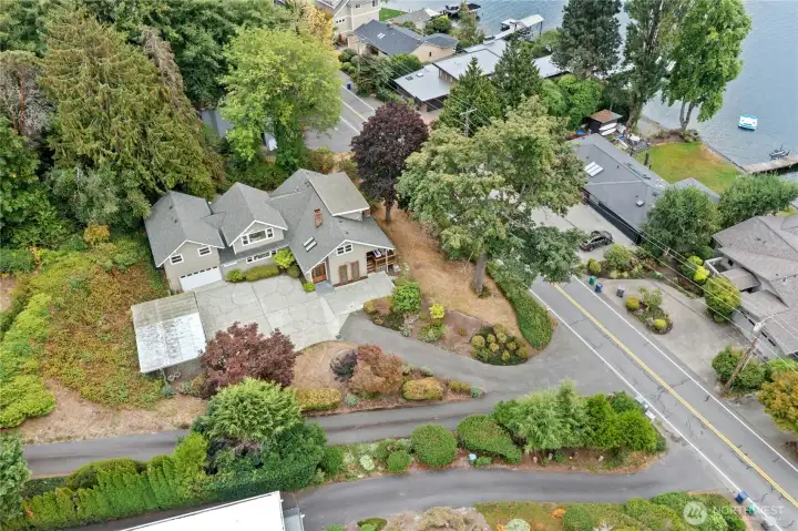 A rare opportunity to own a classic Holmes Point estate with breathtaking views and timeless appeal.