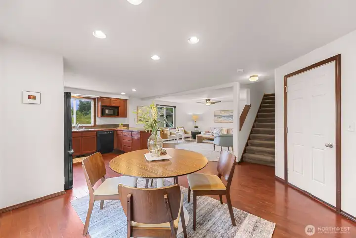 View of the dining area in relation to the kitchen & living room.