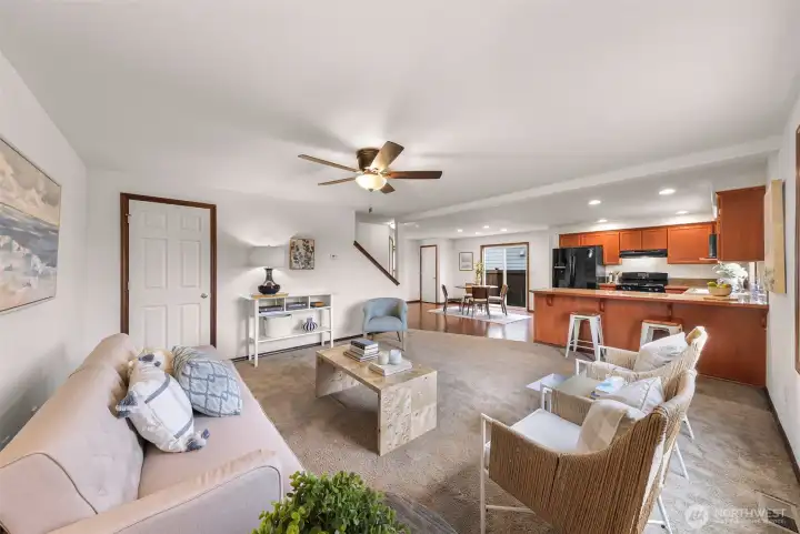 From the far corner of the living room, overall view of the interior on the main floor.