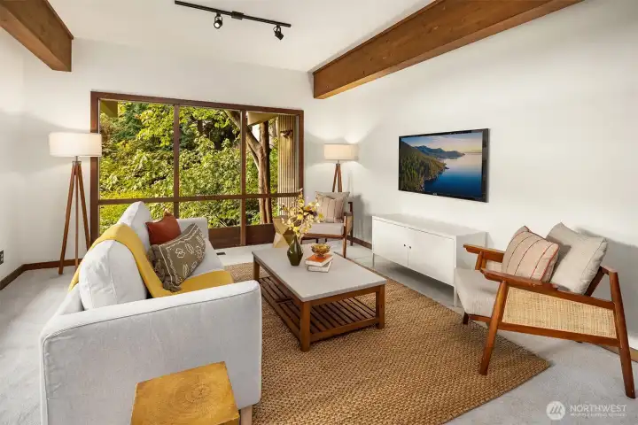 Downstairs bonus room features a deck with views, new carpet and a closet.