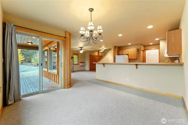 Dining Room With Slider to Covered Deck.