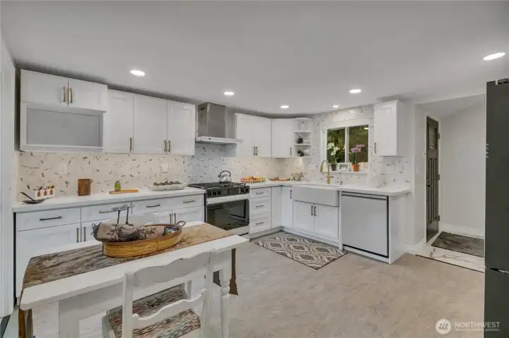 You could walk across the kitchen and right out the back door to the back deck and garage just through the laundry room and half bath or...