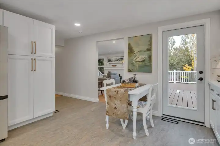 Looking left, the hallway will take you down to the bedrooms and full bath and intersect with the entry.