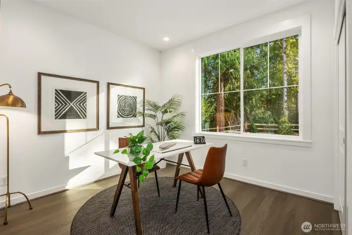 Main floor secondary bedroom shown as an office Main floor secondary bedroom shown as an office