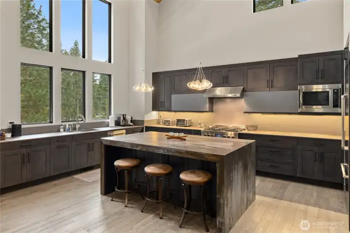 Kitchen Area with large windows brining in natural light