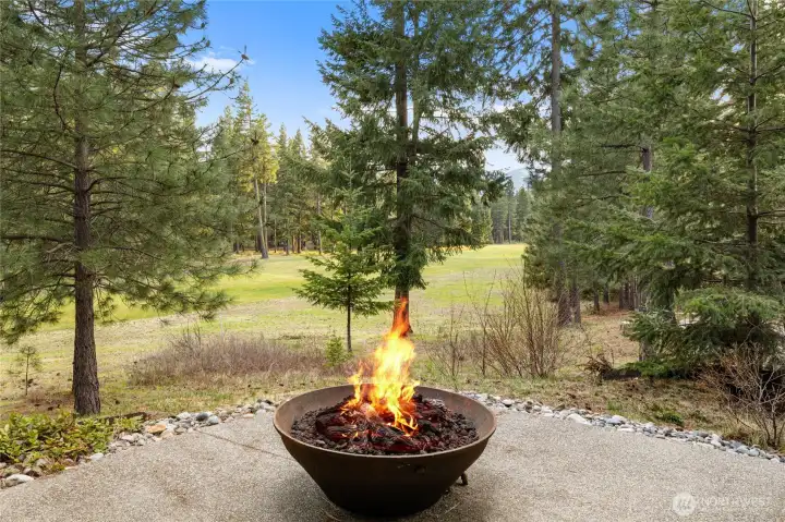 Built in gas firepit overlooking golf course
