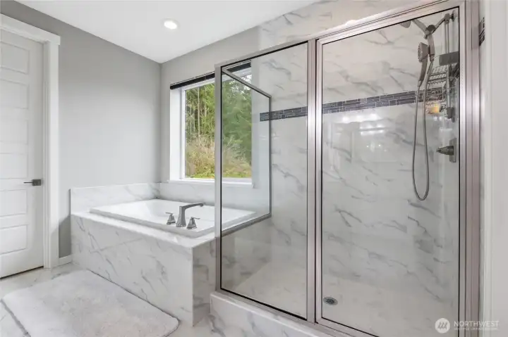Luxurious 5-piece primary with soaker tub and walk-in shower