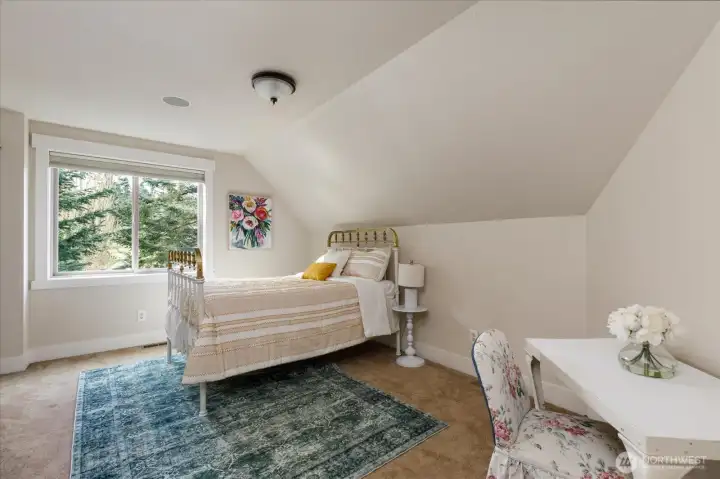 Smaller upstairs west facing bedroom with option to add a 3/4 bath