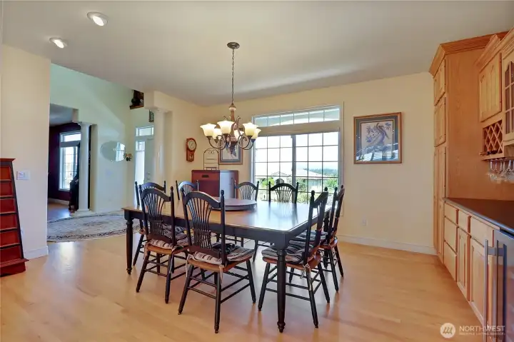 Formal dining with Built in cabinets and wine fridge