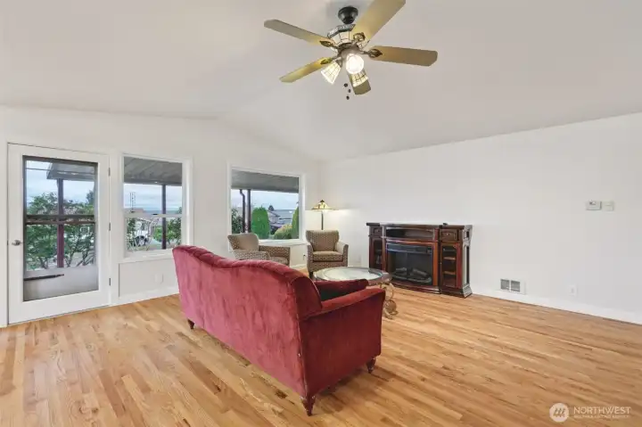 Living room has access to the covered front porch.