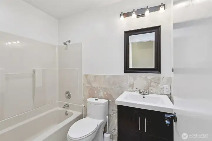 Second full bathroom located off the hall.