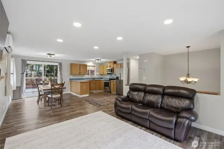 Just at the top of the stairs you have the entrance to either turn left to enter the living room as shown here, or go right to the 3 bedrooms and hall way bathroom.