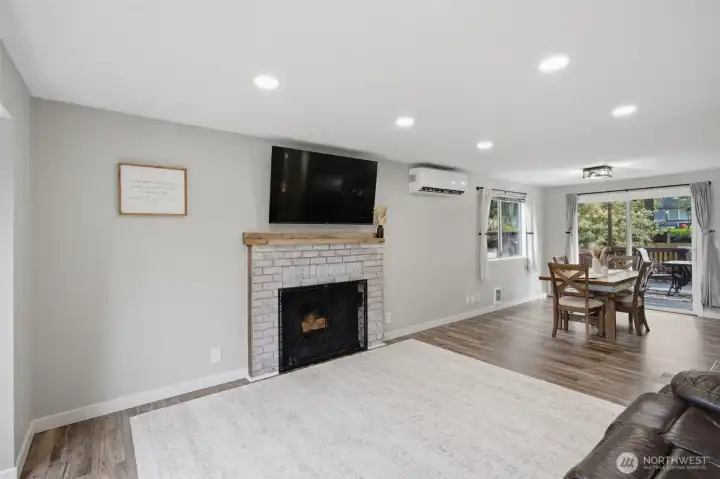 Take in the new LVP floors throughout the home. You can see the the installed mini split for A/C and extra heat. Not to mention the upgraded lighting through out the home.