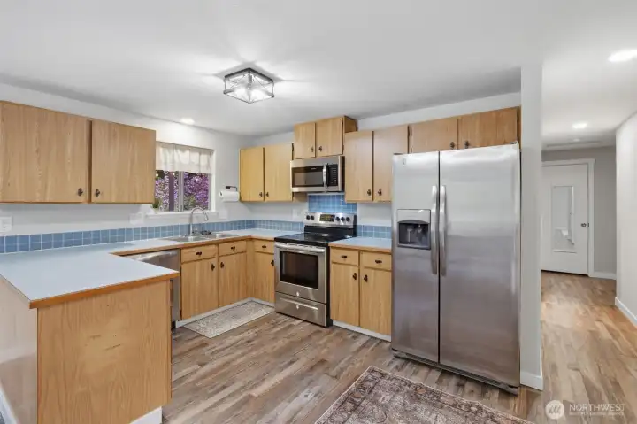 Again, these stunning new floors bring such a clean & updated feeling to this lovely home.