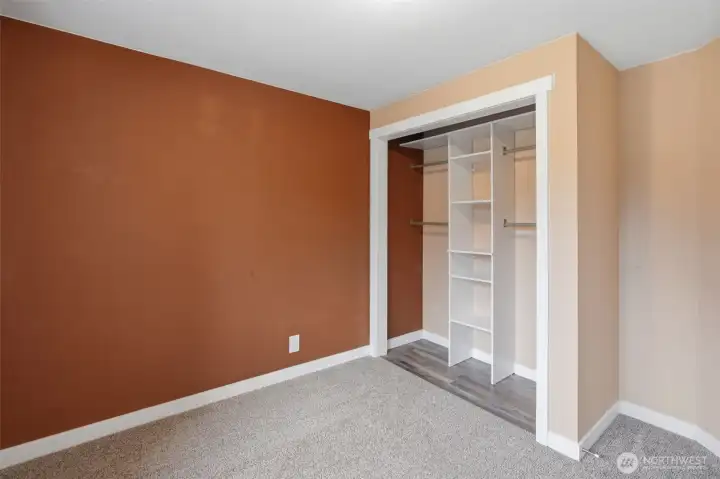 Another view of bedroom #2. Just a crossed the hall from the primary bedroom. Close enough to keep an ear out for those little ones. Look at the great closet system installed to help manage clothes and organization