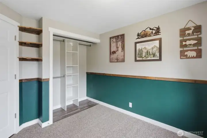 Another photo of bedroom #3, it also has a closet organization system installed.