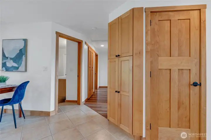 closet by the front door and hallway