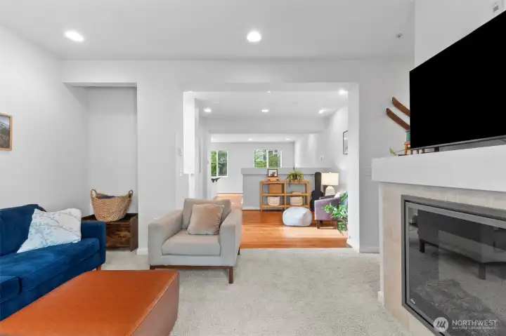 Stay connected within multiple living spaces. Kitchen flows to flex space, flowing into living room and out to balcony deck. Stay connected within multiple living spaces. Kitchen flows to flex space, flowing into living room and out to balcony deck.
